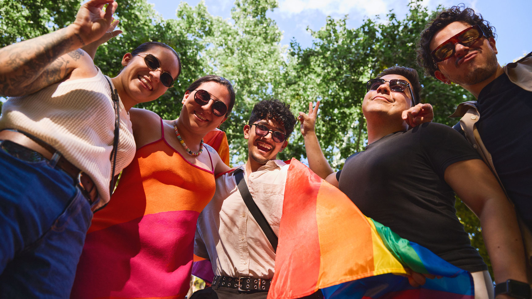 Diverse group of people celebrating pride