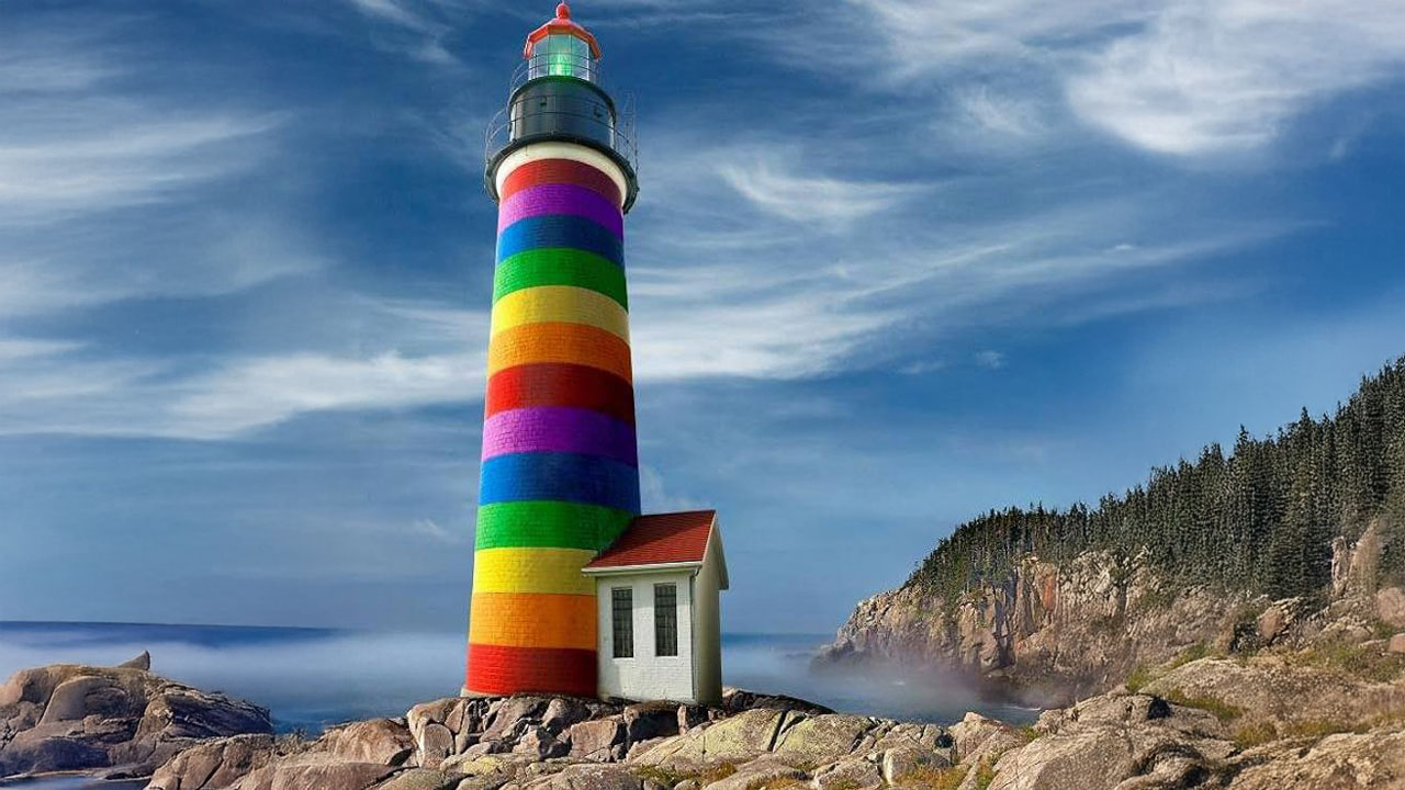 Lighthouse painted in rainbow stripes